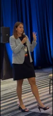 Dr. Jen Halter presenting to an audience