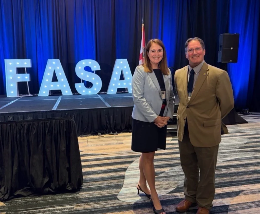 Dr. Jen Halter and Dr. Kyle Dresback at the FASA conference